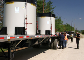 Members of the Public Utilities Commission of Ohio Inspect the First Shipment of Treated Low-Level Radioactive Waste from Fernald's K-65 Silos. Approximately 2,000 Shipments Will Travel 1,340 Miles to a West Texas Storage Facility Until the End of the Year.
Keywords: Fernald Closure Project Fernald Green Salt Plant, Feed Materials Production Center, Fernald, Ohio (FEMP)