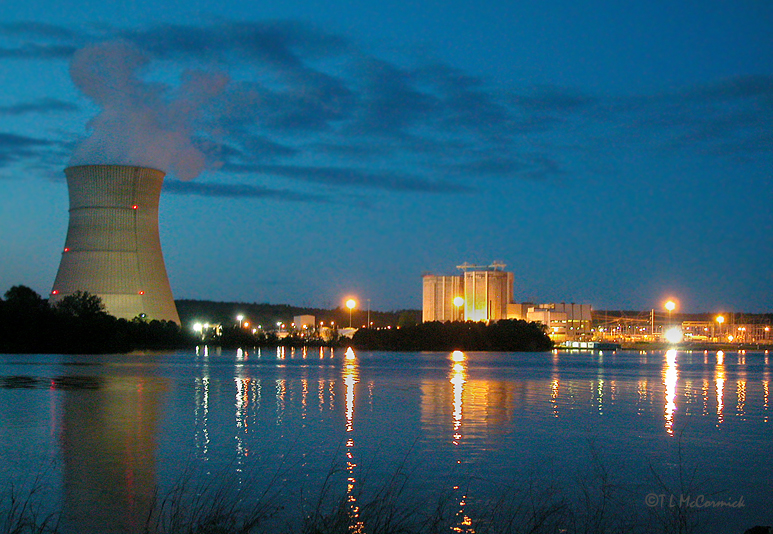 ANO
ANO is Arkansas' only nuclear powered electric generation station, and is owned and operated by the Entergy Corporation. Shown here after dusk, it operates 2 reactors, only one of which uses the visible cooling tower to condense the dry steam created to run the turbines back into liquid water. The other uses the lake water and simply returns the hot water to this "effluent, or discharge" pool off of Lake Dardanelle, creating a great winter fishery. 
