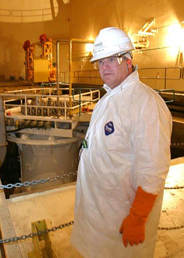 Davis Bessie Nuclear Power Plant
Lew Meyers, the head of First Energy's nuclear division, stands in front of the newly replaced reactor head in the containment vessel at the Davis-Besse Nuclear Power Station in Oak Harbor, Ohio, Friday, Feb, 27, 2004. The power station has been shut down for two years while the reactor head was replaced due to corrosion damage. It is now up to the Nuclear Regulatory Comission to authorize a restart.
Keywords: Davis Bessie Nuclear Power Plant