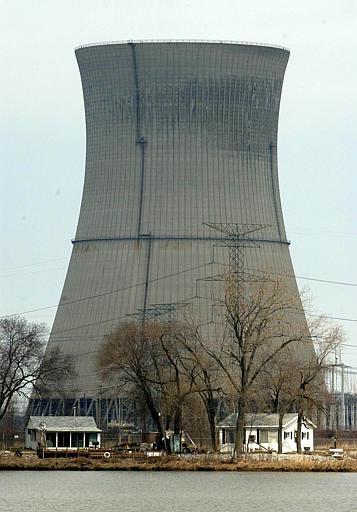 Davis Bessie Nuclear Power Plant
Houses stand near the cooling tower of the Davis-Besse nuclear power plant in Carroll Township near Oak Harbor, Ohio, March 12, 2002. An acid leak had eaten a 6-inch deep hole in the reactor's steel safety cover. The damage was the most extensive corrosion ever at a U.S. nuclear reactor and led to a nationwide review of all 69 similar plants. Two plants, one in Tennessee and another in Texas, have found leaks and a small amount of corrosion on the reactor heads.
Keywords: Davis Bessie Nuclear Power Plant