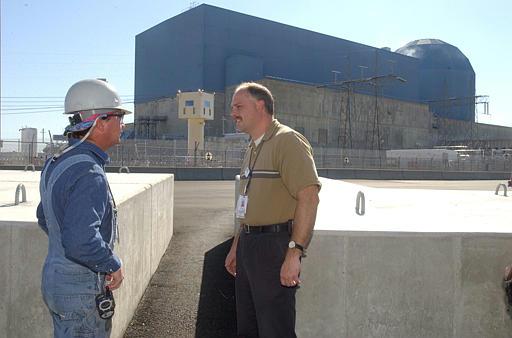 Clinton Nuclear Power Plant
Charles S. Williamson, security manager Exelon Generation Company, right, talks to a worker next to rows of 55,000-pound concrete blocks, that act as barriers to vehicular attack, Monday, Oct. 25, 2004, at the Clinton Power Station in Clinton, Ill. New post-9/11 federal rules designed to protect nuclear reactors from terrorist assaults have lead to the sprouting of seven 20-foot-high tan-colored guard towers which now ring the station.
Keywords: Clinton Exelon Nuclear Power Plant