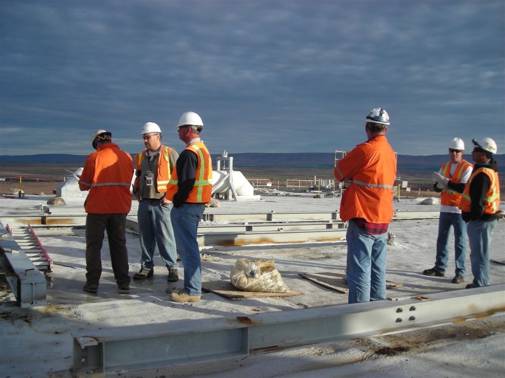 100N, 105N 70' roof
crew of workers, management and engineers discuss upcoming work in the process of demo-ing at the N-reactor, Hanford, Wa.  Picture taken May 20, 2010.
