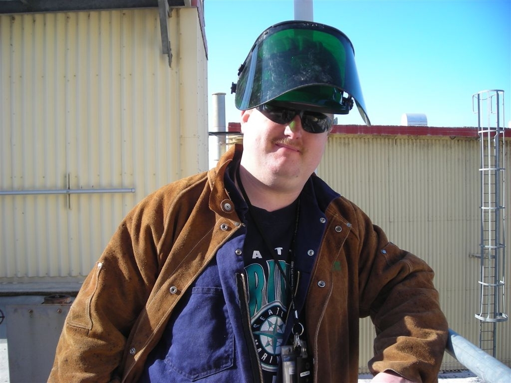Brian, laborer for Dickson in his fire watch gear, 2009

