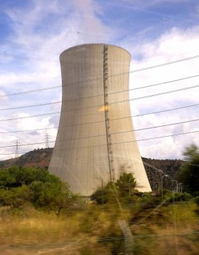 Asco cooling tower beside power lines