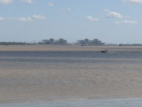 Blayais distant buildings with a small boat