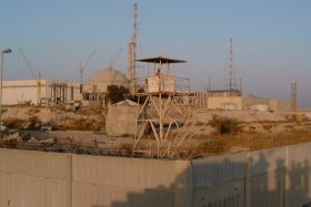 Bushehr dome and watchtower behind a wall