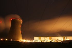 Dampierre night view with red-lit towers